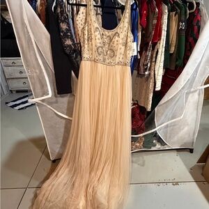 Elegant Cream Beaded Evening Gown